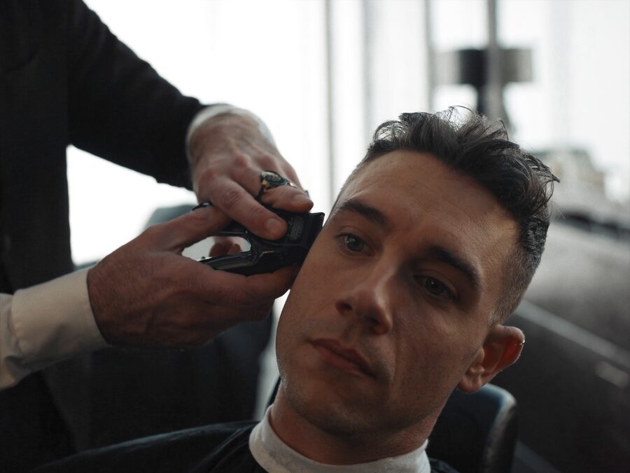 Razor gliding over a clean-shaved head